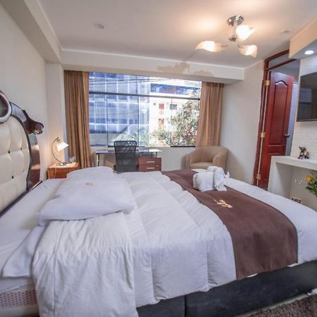 Jk Guzman Suite Hotel Чальюауачо Экстерьер фото