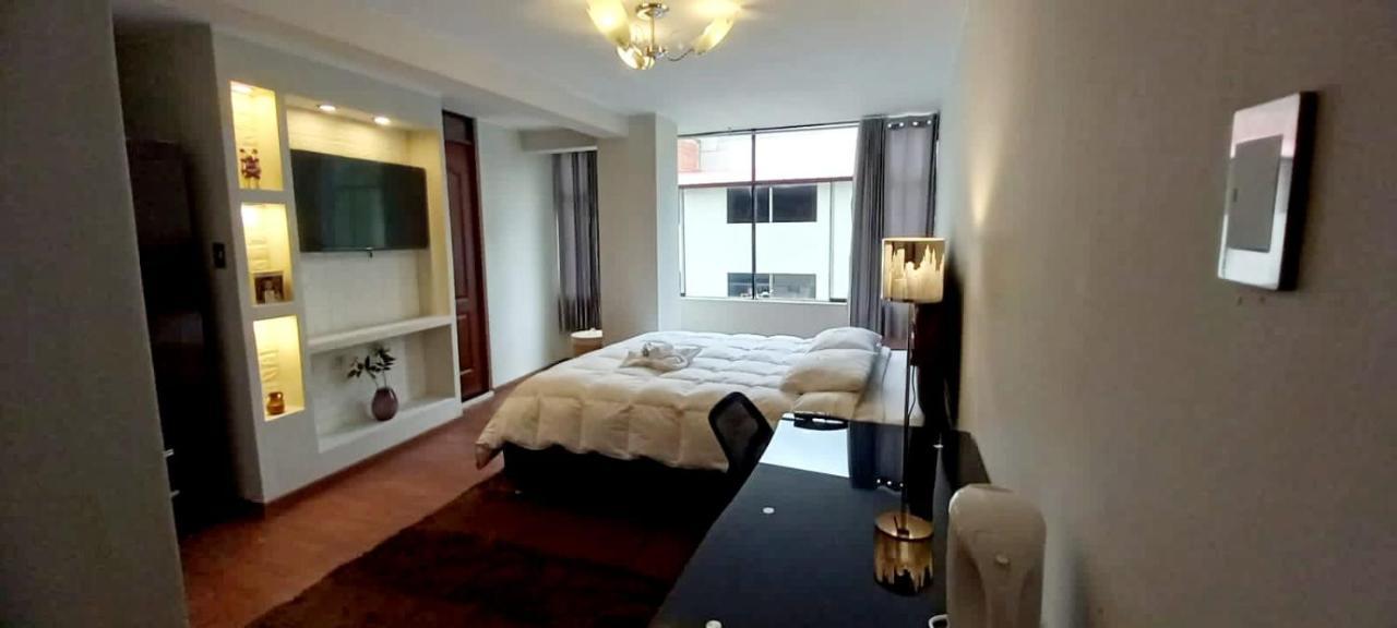 Jk Guzman Suite Hotel Чальюауачо Экстерьер фото